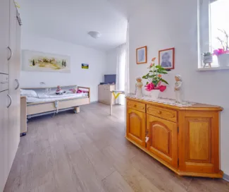 Zimmer und Wohngruppe in der st Pflege 1